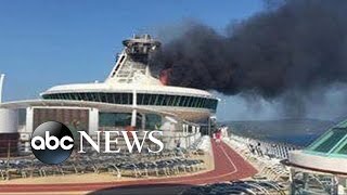 Burning Cruise Ship Arrives Into Jamaican Port [upl. by Shadow]