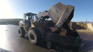 Picking up a load of top soil with the Delco dump trailer [upl. by Airahcaz]