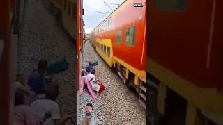 Railway Track Ruckus Passengers Cross Seconds Before Trains Arrival Shorts ViralVideo [upl. by Nysila768]