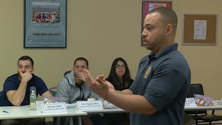 Police officers take course teaching deescalation techniques [upl. by Aenil]