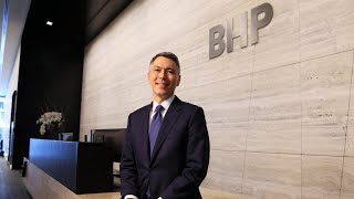 BHP slashes dividend and reports drop in underlying earnings [upl. by Lirrad]