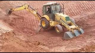 Retroescavadeira New Holland LB90 Cortando Rampa Part 1 [upl. by Sivra]