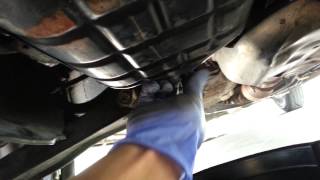 How to change oil Nissan Maxima V6 [upl. by Ahtnamys]