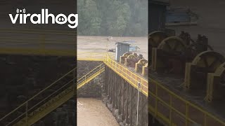 Pontoon Boat Goes Over Flooded Dam in Virginia  ViralHog [upl. by Svoboda]