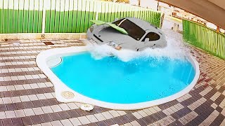 Car Crashes into Pool [upl. by Ettedualc]