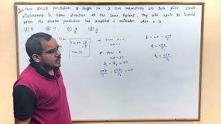 Two simple pendulums of length 1 m and 16 m respectively are both given small displacements in the [upl. by Jabez95]