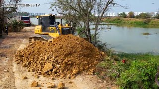 Opening new project Dozer shantui pushing soil into water and 17 ton trucks [upl. by Enriqueta851]