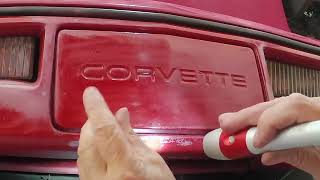 C4 Corvette Front License Plate cover Removal [upl. by Hovey873]