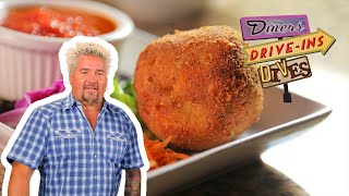 Guy Fieri Eats Luigis Arancini  Diners DriveIns and Dives  Food Network [upl. by Otrebla]