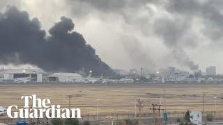 Explosions and fire at Khartoum airport as fighting continues in Sudan [upl. by Fessuoy613]