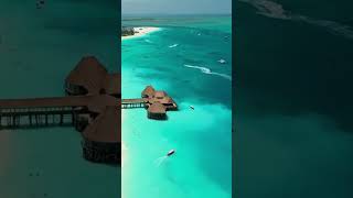 Explore Zanzibar Stone Town Nungwi Beach amp Mnemba Atoll Snorkeling Adventure [upl. by Fruma]