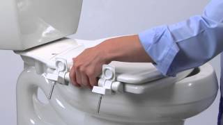 How to Install Toilet Seat  Easy•Clean amp Change™ with STATITE® Seat Fastening System™ Flip Cap [upl. by Saidnac]