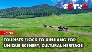 Tourists Flock to Xinjiang for Unique Scenery Cultural Heritage [upl. by Vergos677]