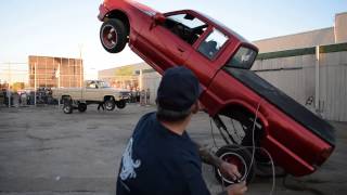 Shortys Hydraulics vs Chris at 2015 Lowrider Movie Night Houston [upl. by Pellet]