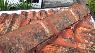 A cheap house gutter job on a tile roof [upl. by Ahron]