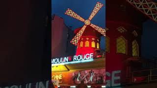 The Moulin Rouge lit up at night in Paris travel paris france [upl. by Clarisa]