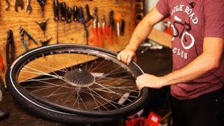 How to Put on New Bike Tire amp Tube  Bicycle Repair [upl. by Einnok11]