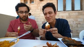 Eating Seafood with Mark Wiens in Pakistan CRAB CLAW Lollipops Fish Market in KarachiPakistani [upl. by Ahsoem]