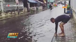 Pria Ini Berenang di Genangan Air Banjir yang Dangkal [upl. by Etnaid657]