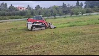 Mulczer bijakowy z napędem hydraulicznym FAE PMM SSL na ładowarce typu skid steer Takeuchi TL12 [upl. by Waldner]