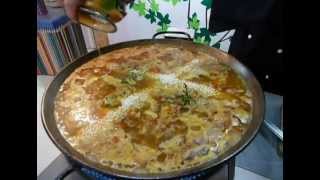 ARROZ FACIL EN PAELLA CON JAMÒN POLLO Y CERDO [upl. by Rdnaskela]