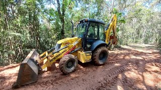 ACERTANDO TERRENO COM A RETROESCAVADEIRA NEW HOLLAND B95B retroescavadeira extremo [upl. by Eyahs886]