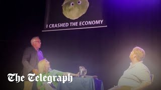 Liz Truss storms off stage after lettuce banner stunt [upl. by Eiramadnil]