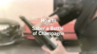 How to Safely Saber a Champagne Bottle [upl. by Paschasia525]