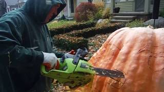 Giant Pumpkin Jack O Lantern carved with a Chainsaw [upl. by Merrielle990]