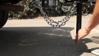 How To Attach Safety Chains  TrailersPlus [upl. by Nahsrad]