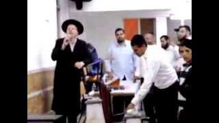 Charedi Rabbi Holds Public quotSmashing iPhone Ritualquot In Shul [upl. by Sibel]