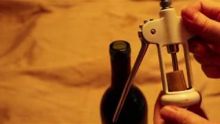 How to Use a Wing  Lever Corkscrew to Open a Wine Bottle [upl. by Theurich862]