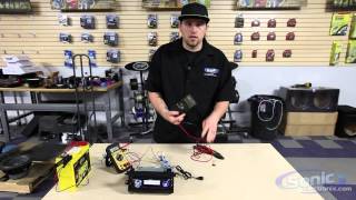 How to Use a Digital Multimeter Checking Voltage  Car Audio 101 [upl. by Esilanna]