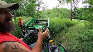 John Deere 4044M pushing trees over [upl. by Meraree242]