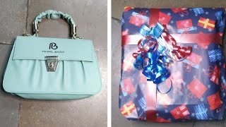 How to wrap a bagpurse  gift wrapping ideasdiy easy gift packing ideas wrapping wrappinggifts [upl. by Prady]