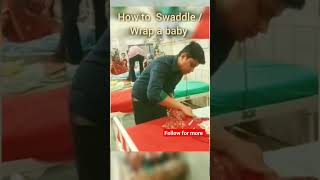 How to Swaddle a babywrapping baby babyshorts babyreels ytshorts shortsfeed newborncare [upl. by Stine]