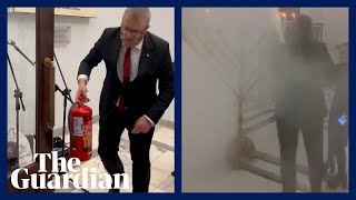 Farright Polish MP extinguishes Hanukkah candles in parliament [upl. by Eoz]