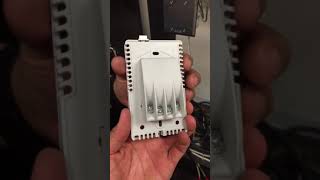 NUHEAT Thermostat tutorial videos Step 2 Removing the Faceplate [upl. by Uzia]