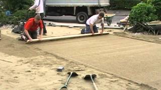 Screeding a paving laying course [upl. by Petunia]