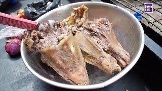 How to eat Goats Head in Nigeria [upl. by Aihtebat60]