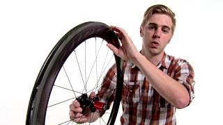 Zipp 404 Firecrest Carbon Clincher Road Bike Wheel Review by Performance Bicycle [upl. by Laumas]