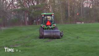 23 John Deere 3046R Cab Tractor Rolling Ruts Out of Lawn [upl. by Anivahs72]