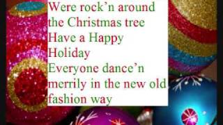 rockn around the Christmas tree lyrics [upl. by Nosemyaj]