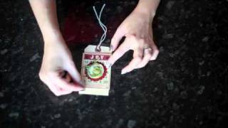 Christmas Tag Garland with fabric flowers and Jenni Bowlin Studio [upl. by Ashbey35]