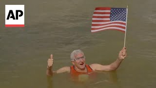 75yearold swimmer takes a dip in the River Seine to mark July 4th [upl. by Tati]