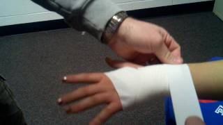 HF AT Aides How to Tape a Wrist and Hand [upl. by Nosnorb967]