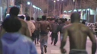 African migrants storm border into Spains Melilla [upl. by Barth]