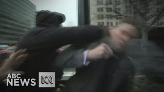 Farright activist Richard Spencer punched during interview  ABC News [upl. by Enrobialc]