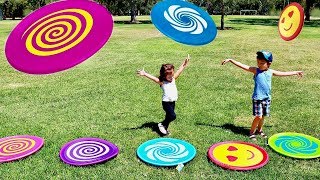 Toddlers Playing HUGE Frisbee Toys at the Park  Learn Colors with Giant Colored Disk for Children [upl. by Rehctelf917]