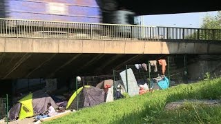 Hundreds of migrants camp in northeast Paris [upl. by Namzzaj]